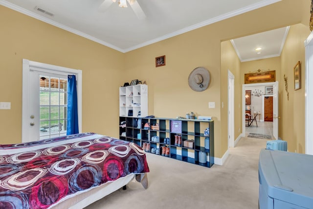 bedroom featuring ceiling fan, light colored carpet, and crown molding