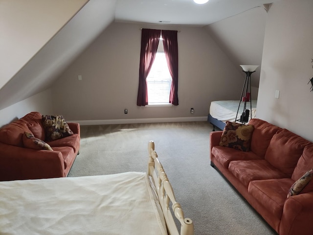 additional living space featuring carpet and vaulted ceiling