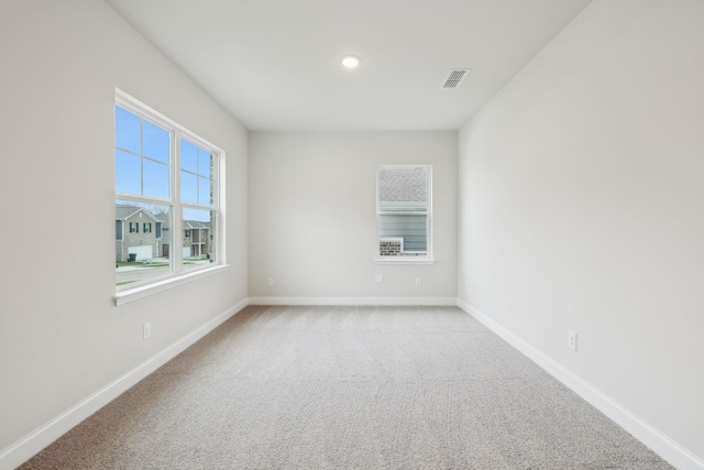 view of carpeted spare room