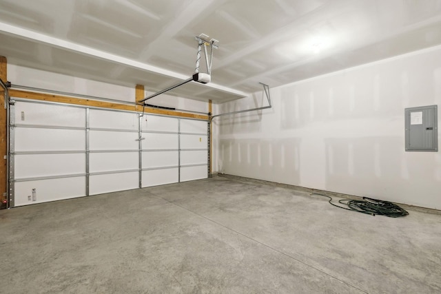 garage with electric panel and a garage door opener