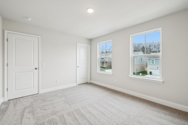 view of carpeted spare room