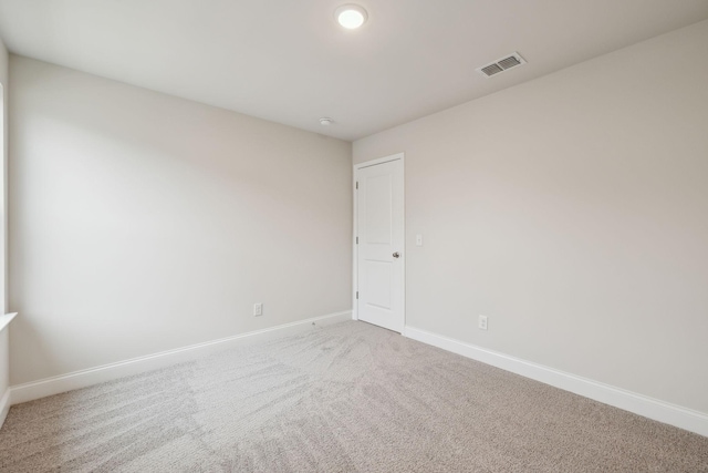 empty room featuring carpet flooring