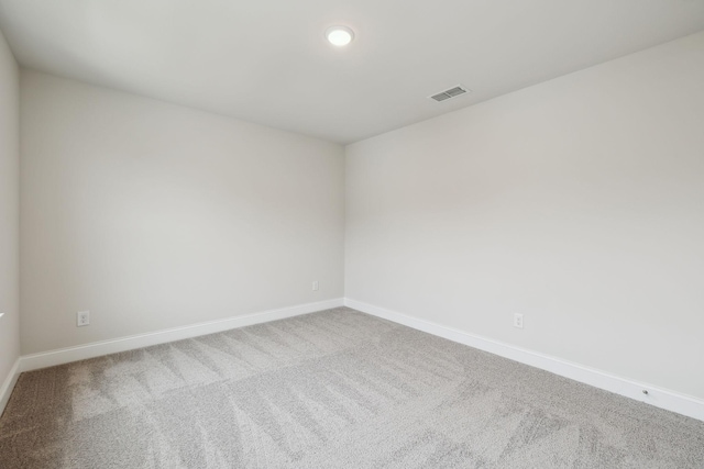 empty room featuring carpet