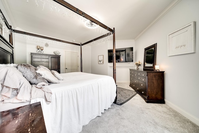 bedroom with light colored carpet and crown molding