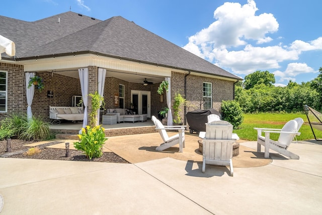 view of patio / terrace featuring outdoor lounge area, ceiling fan, and a grill