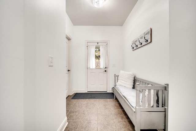 entryway with tile patterned flooring