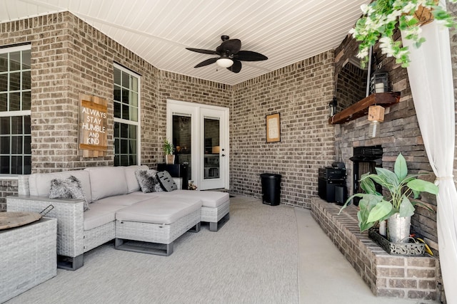 view of patio with outdoor lounge area and ceiling fan