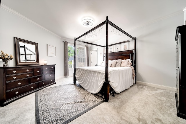 carpeted bedroom with crown molding