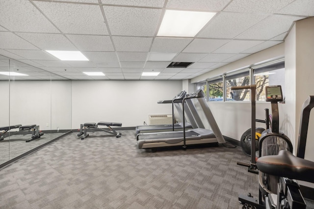 900 19th Ave S Unit 103, Nashville, TN 37212 - exercise room with carpet flooring, a paneled ceiling, and a wall mounted air conditioner