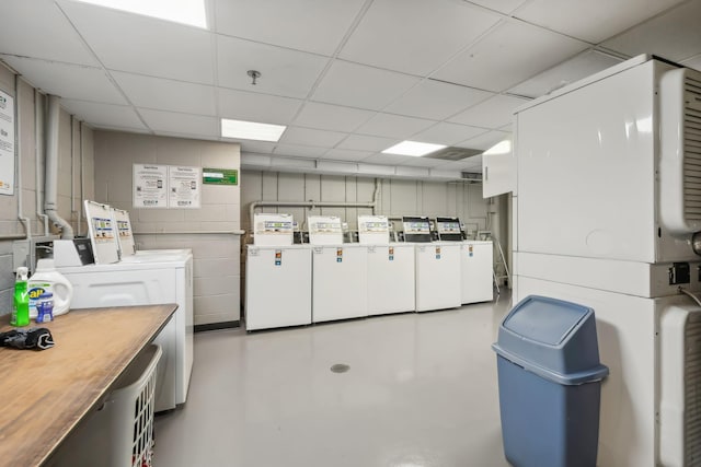 clothes washing area with washer / clothes dryer