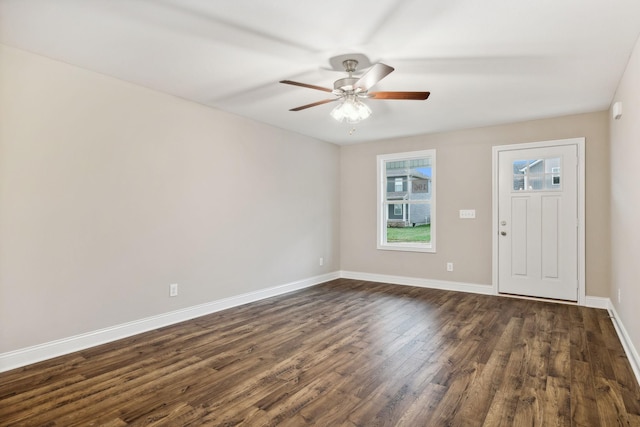 entrance foyer with ceiling fan and dark wood-type flooring