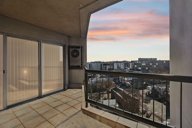 view of balcony at dusk