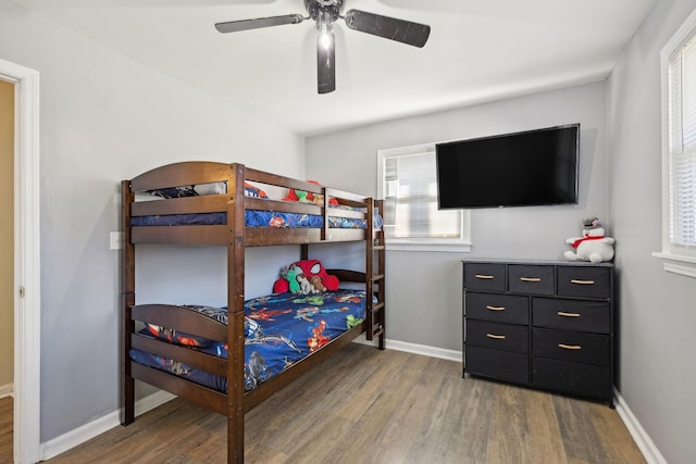 bedroom featuring ceiling fan and wood-type flooring