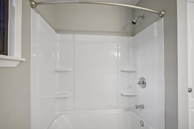 bathroom with shower / tub combination