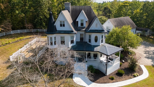 back of house with a porch