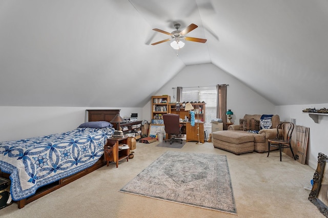 carpeted bedroom with ceiling fan and lofted ceiling