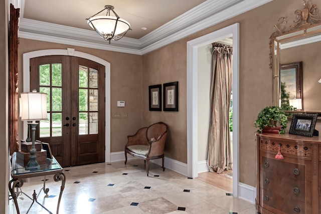 entryway with french doors and ornamental molding