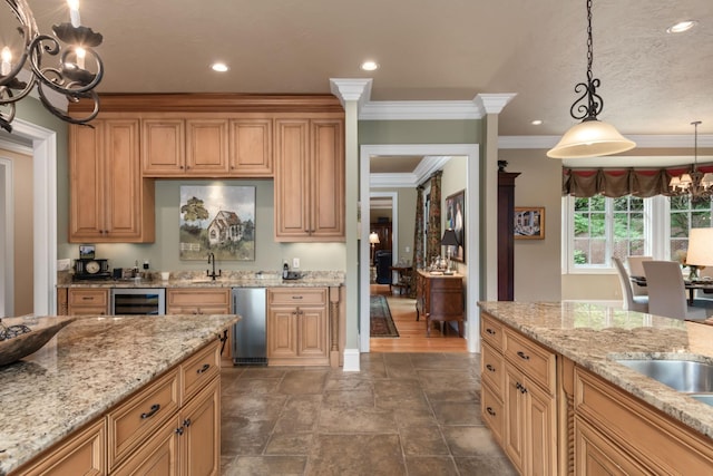 kitchen featuring a chandelier, pendant lighting, light stone counters, and crown molding