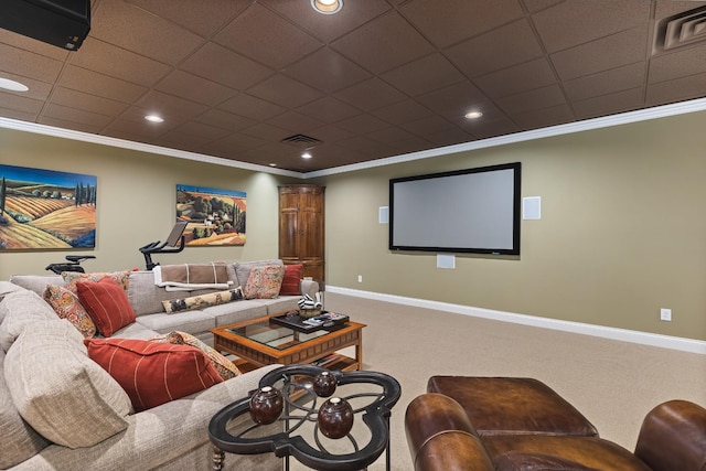 home theater with carpet flooring and ornamental molding