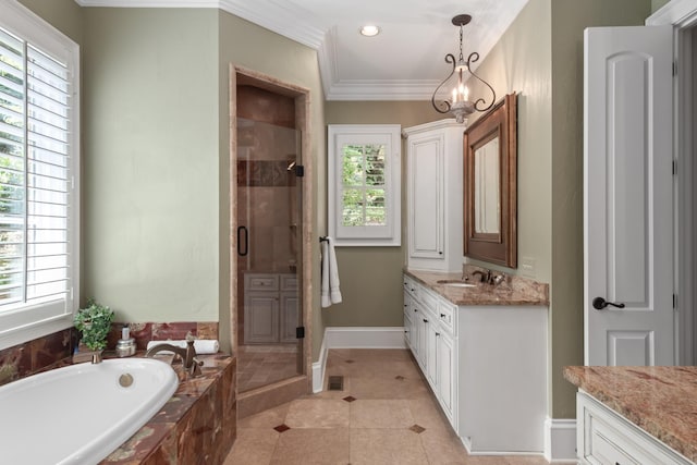 bathroom with plenty of natural light, vanity, independent shower and bath, and ornamental molding