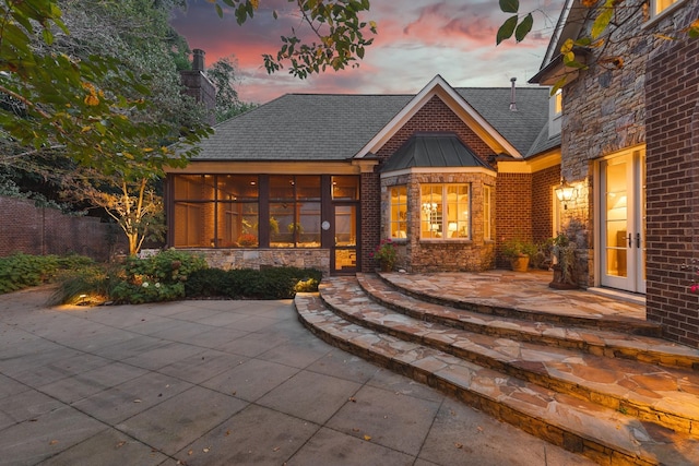 exterior space with a sunroom