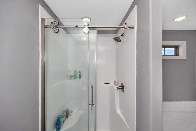 bathroom featuring an enclosed shower