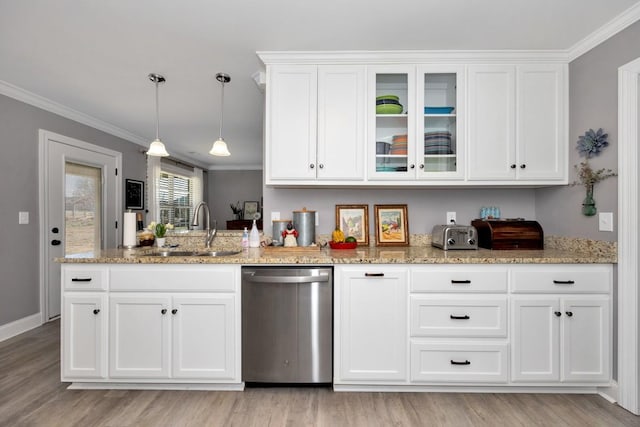 kitchen featuring dishwasher, light hardwood / wood-style floors, crown molding, and sink