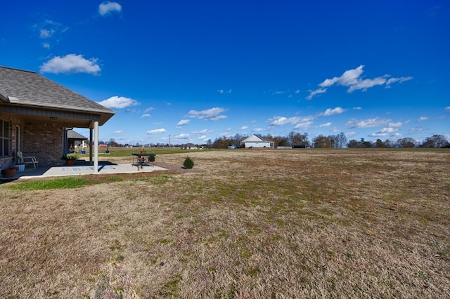 view of yard featuring a patio