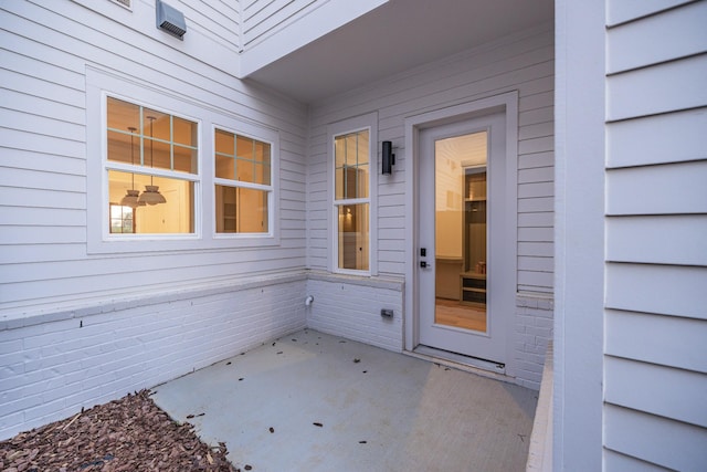 doorway to property featuring a patio