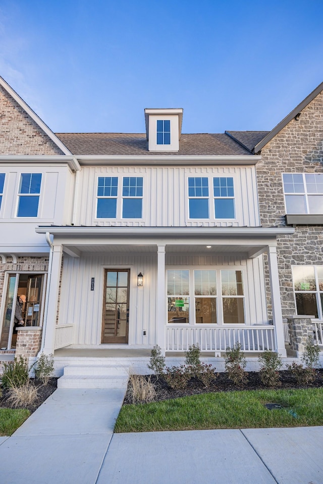 multi unit property featuring covered porch