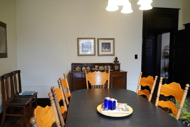 dining room with a chandelier