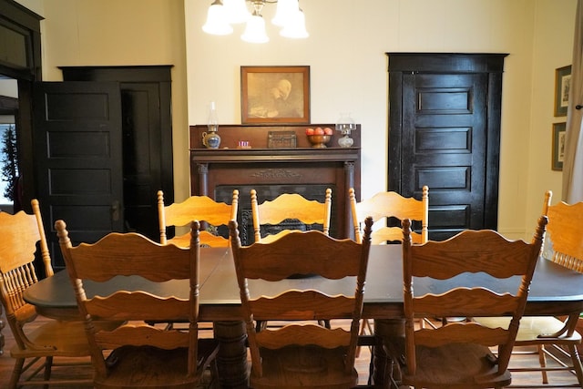 dining space featuring a notable chandelier