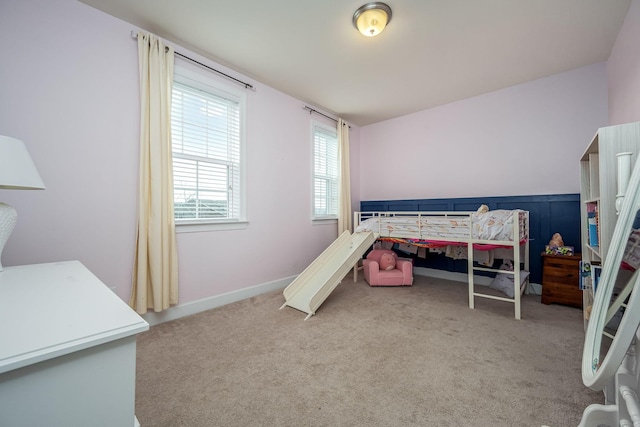 bedroom with light carpet