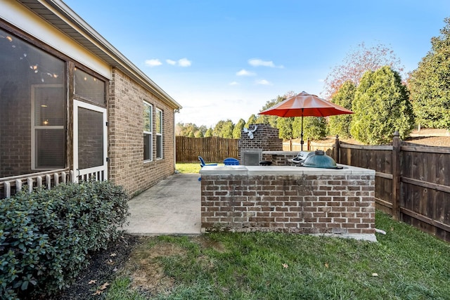 view of patio / terrace featuring exterior kitchen