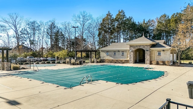 view of pool with a patio