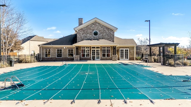 view of pool with a pergola and a patio