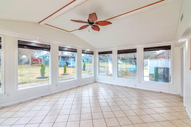 unfurnished sunroom with vaulted ceiling and ceiling fan