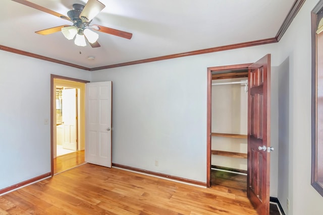 unfurnished bedroom featuring light wood-type flooring, a closet, ceiling fan, and ornamental molding