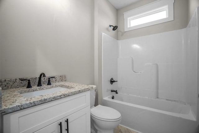 full bathroom with toilet, shower / washtub combination, and vanity