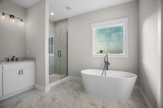 bathroom featuring visible vents, vanity, a freestanding bath, marble finish floor, and a shower stall