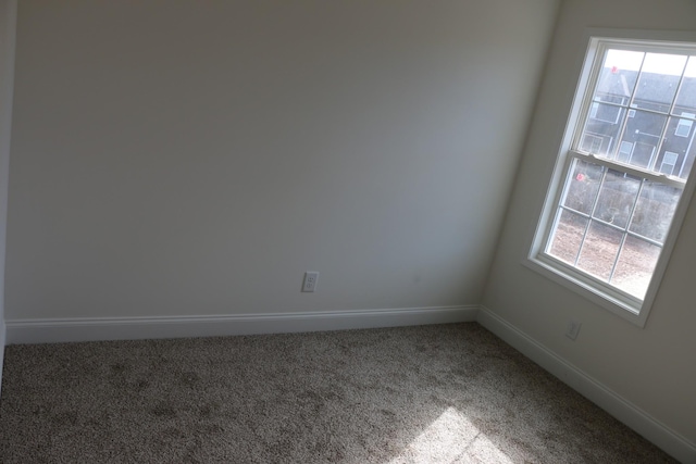 view of carpeted spare room