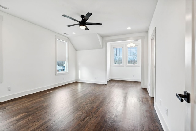 additional living space featuring lofted ceiling, ceiling fan, and dark hardwood / wood-style floors