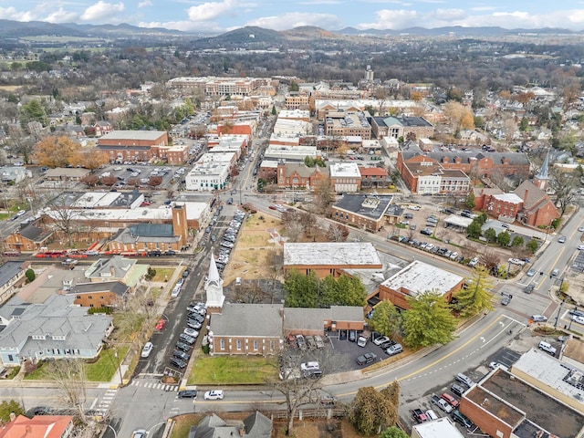 drone / aerial view featuring a mountain view