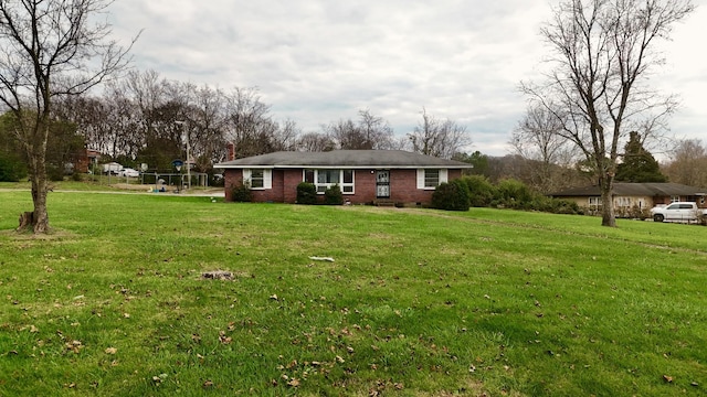 exterior space with a front yard