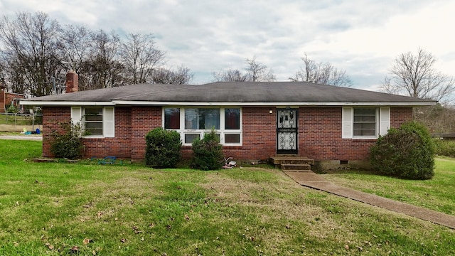 single story home with a front yard