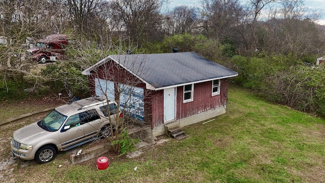 view of outdoor structure featuring a yard