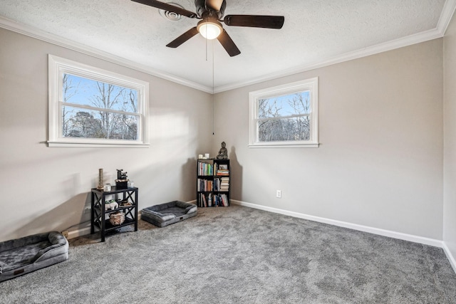 129 Dylark Dr, Waverly, TN 37185 - sitting room featuring healthy amount of natural light, carpet floors, ceiling fan, ornamental molding, and a textured ceiling