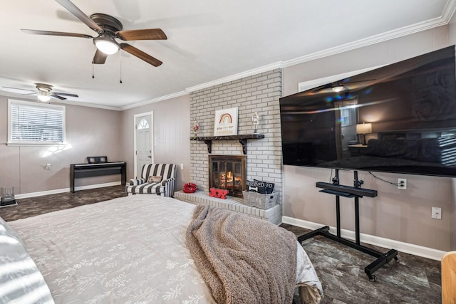 bedroom with ceiling fan, ornamental molding, and a fireplace