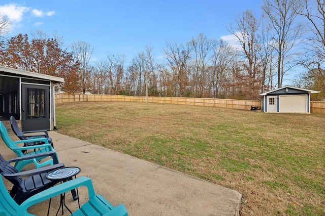 view of yard with a patio area and an outdoor structure