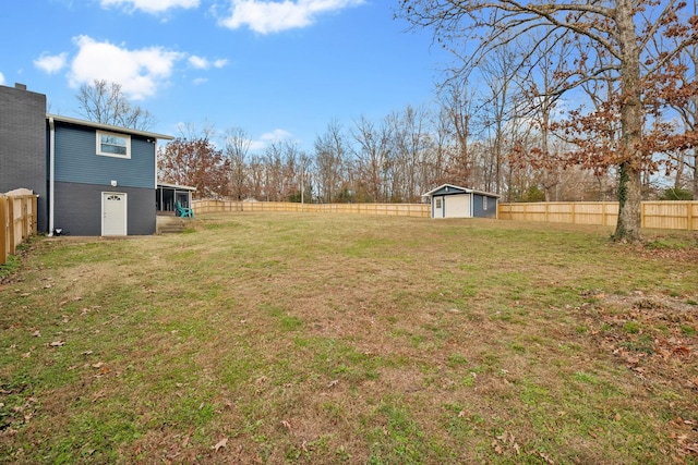 view of yard with an outdoor structure and a sunroom